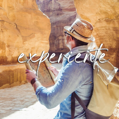 Handsome man, exploring the sights of the ancient, fabulous city of Petra in Jordan. Colorful photos. Concept of leisure, vacation and travel