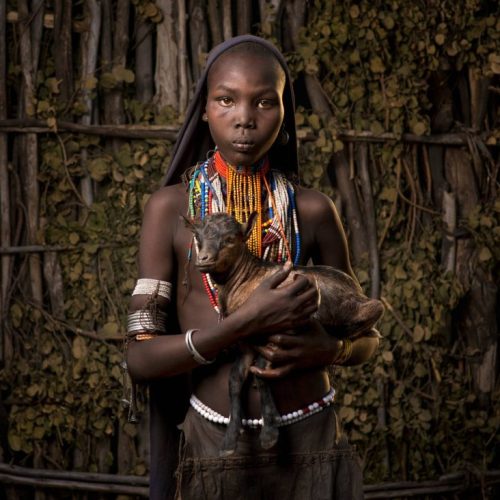 ethiopia-girl-holding-goat-6qnwf8ld40lzse7m-1-1024x732